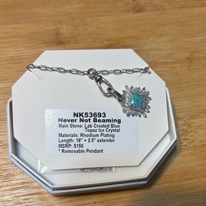 Never Not Beaming: Rhodium Necklace with Blue Topaz Pendant